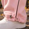 Спортивний костюм рожевого кольору з коричневою окантовкою